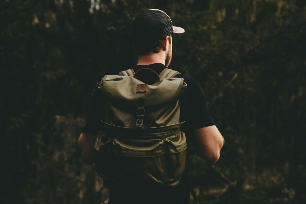 Complete bug out bag with first aid kit, survival tools, flashlight, maps, and personal emergency supplies for prepping and disaster readiness